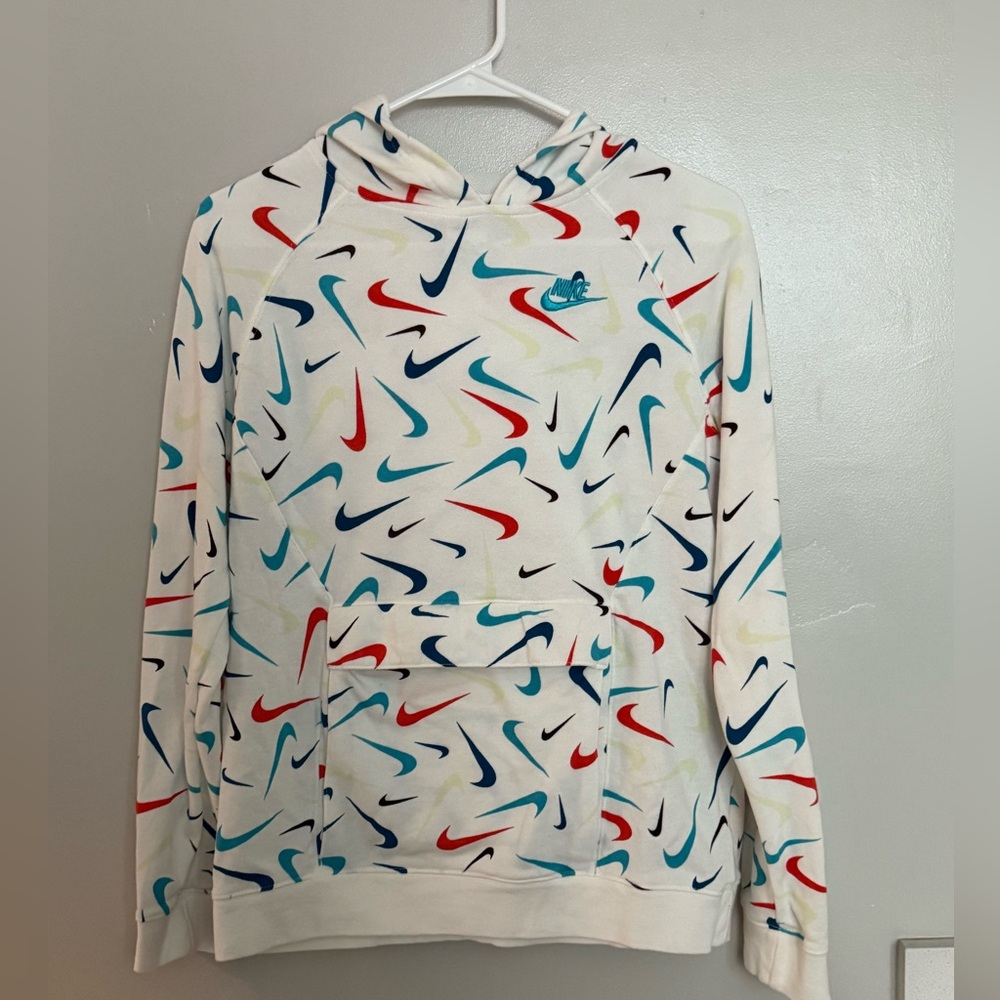 Boys white Nike pullover hoodie. Size XL. Multicolor swoosh print.